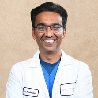 Dr. Pal Manickam
